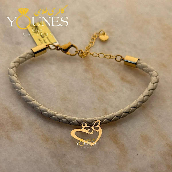 دستبند چرم طوسی شاپرک قلبی طلا